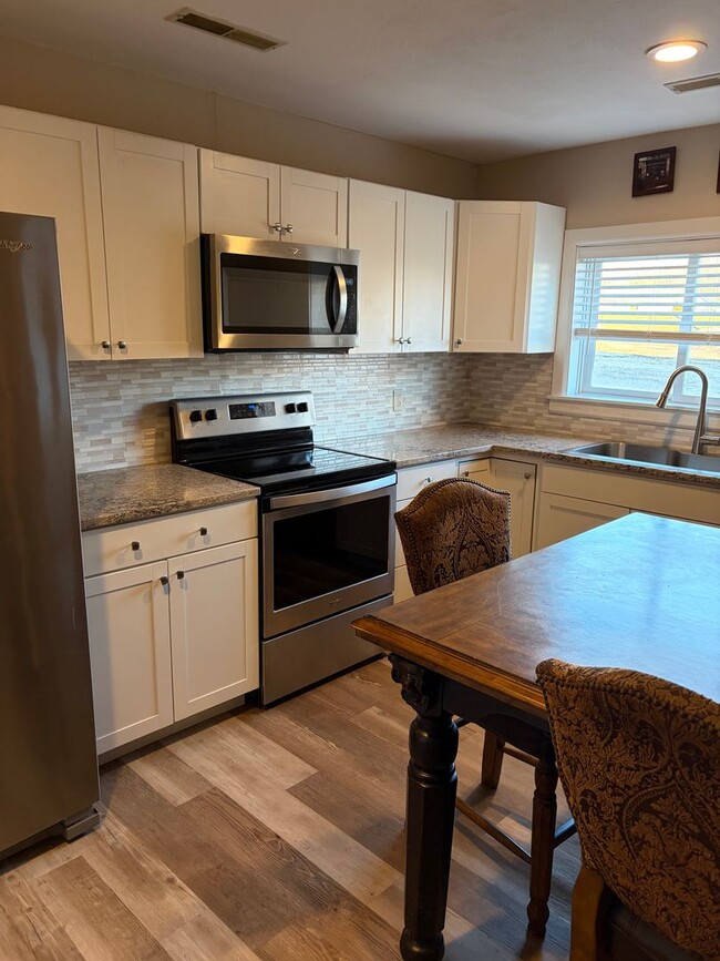 Photo - Premier RE Holdings of Monticello Unit B