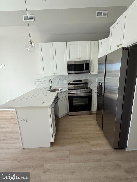 Building Photo - 2421 Frankford Ave Unit 2