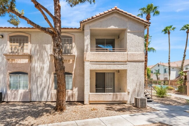 Building Photo - Modern Gated Condo with Stylish Upgrades, Poolside Location & Private Balcony!