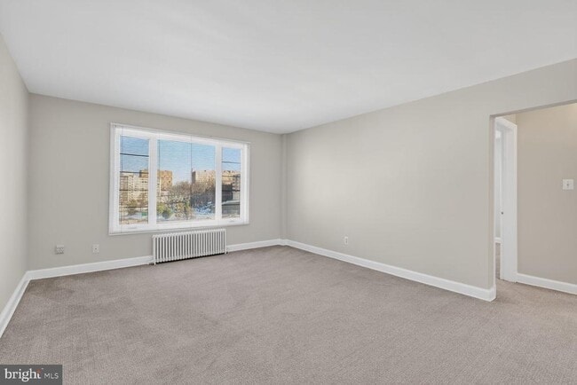 Building Photo - 1410 N Quinn St Unit 6