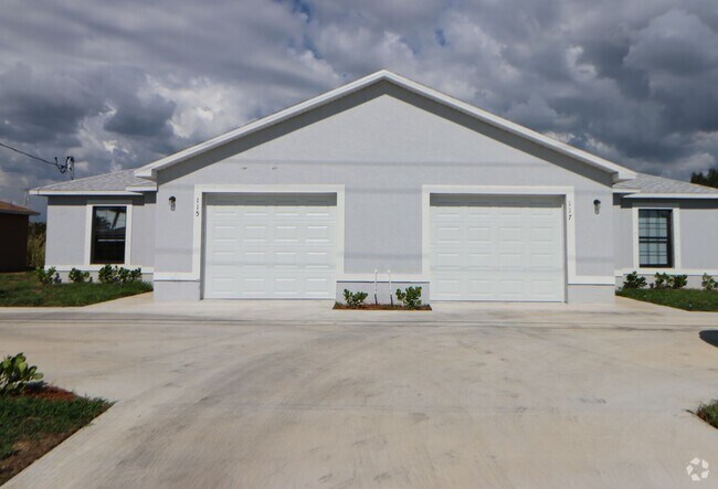 Building Photo - Coming mid July Newer Duplex Waterfront 3/2 Unit 115 Cultural park Blvd S Rental