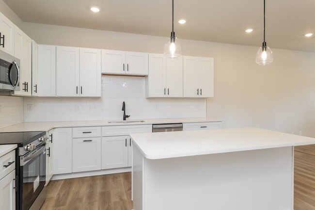 Photo - Beautiful 3BR 2.5BA Townhome w/ Full Appliance Kitchen • Garage Parking in Westerly Hills