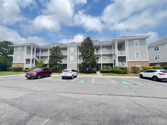 Building Photo - First Floor, 2 Bedroom, 2 Bath Condo with Screened Patio! Community Pool! Available Now!