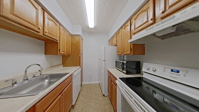 Photo - Bright Pool-View Condo with Private Balcony & Open Living Spaces