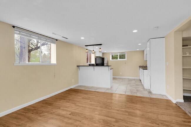 Photo - $1,795.95 - 2 Bed, 1 Bath Duplex Unit in Littleton with Fenced in yard, and In Unit Laundry! Unit 5454 S Elmwood St