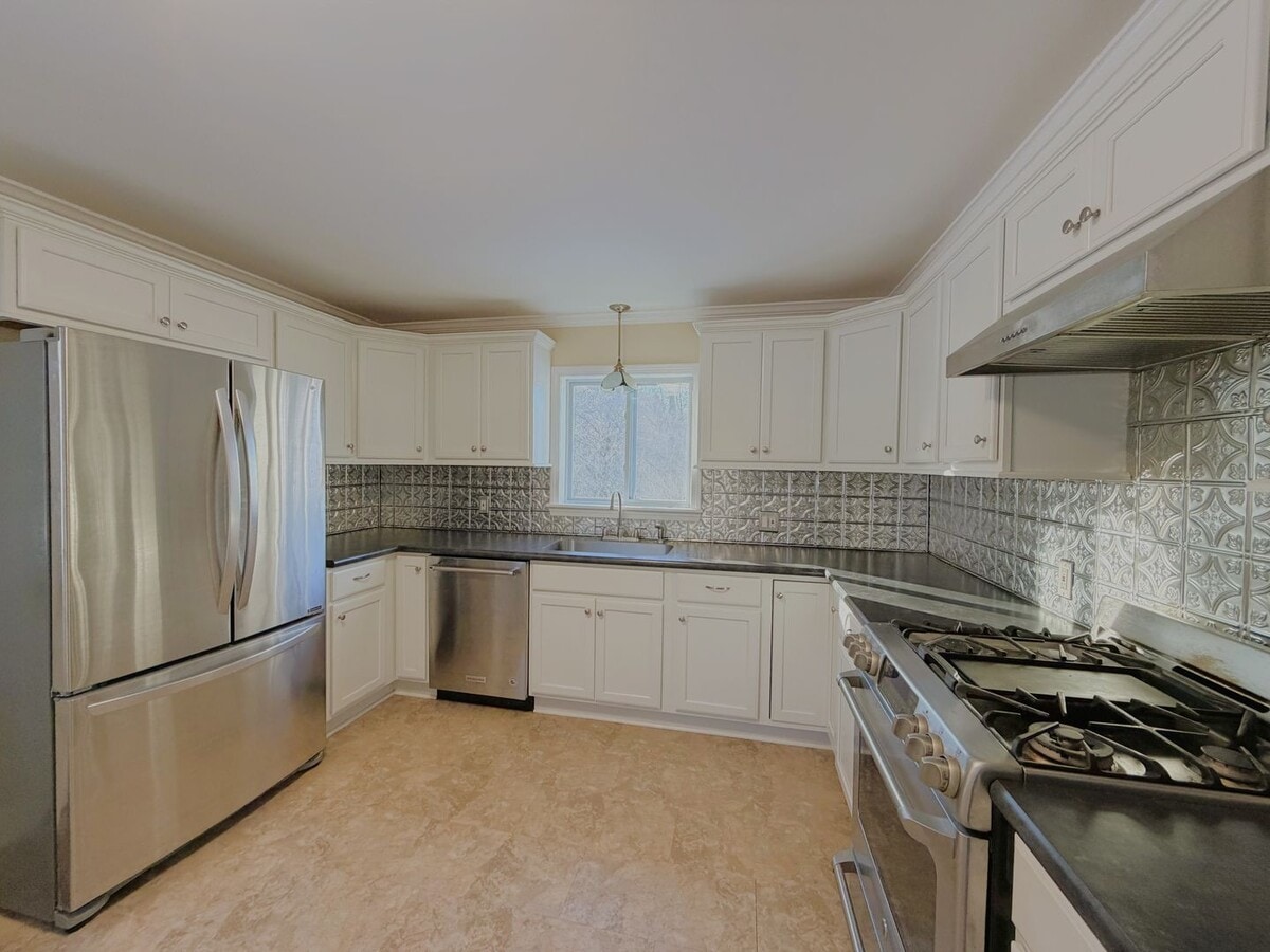 Photo - Single-Family Home with Scenic Views, Large Yard & Spacious Bedrooms