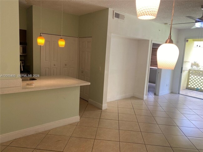 Building Photo - 18330 NW 68th Ave Unit G
