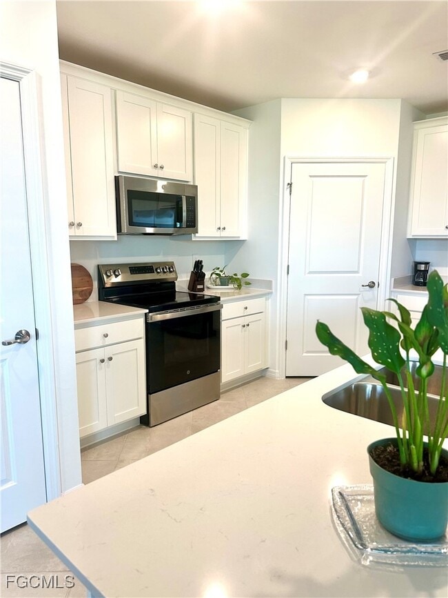 Building Photo - 20610 Hazelnut Ct Unit 1511