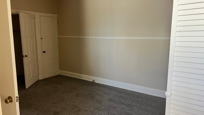 Bedroom back wall, opposite of bathroom - 560 Walnut St Unit #1 first floor