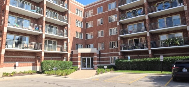 Building Photo - 6430 W Berteau Ave Unit 203