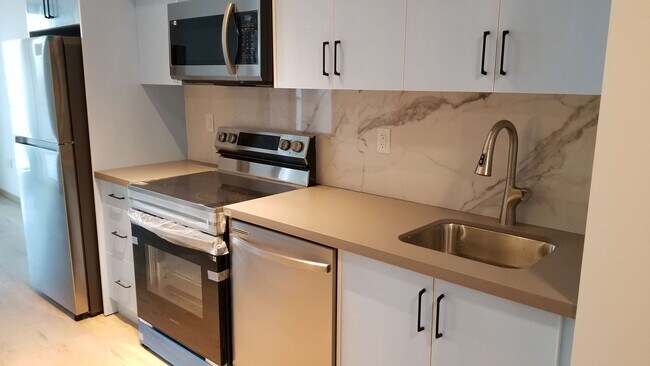 Building Photo - 3429 Sheppard Av E Unit 1-Bedroom and Den