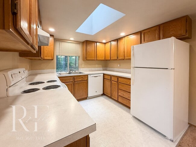Photo - Vaulted Ceilings, Skylights & a True Primary Suite in This Gig Harbor Duplex