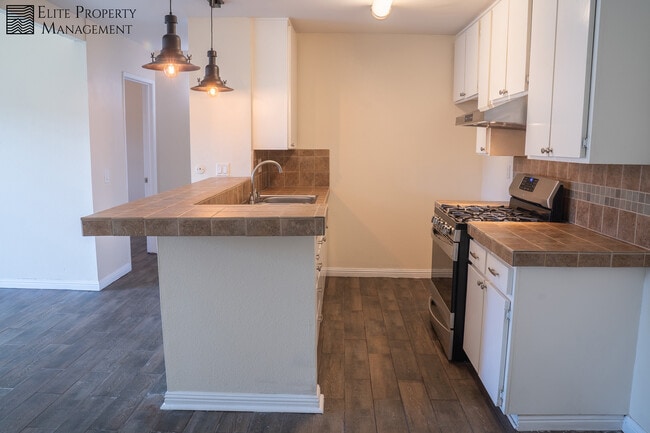 Building Photo - 15220 Ocaso Ave Unit H202