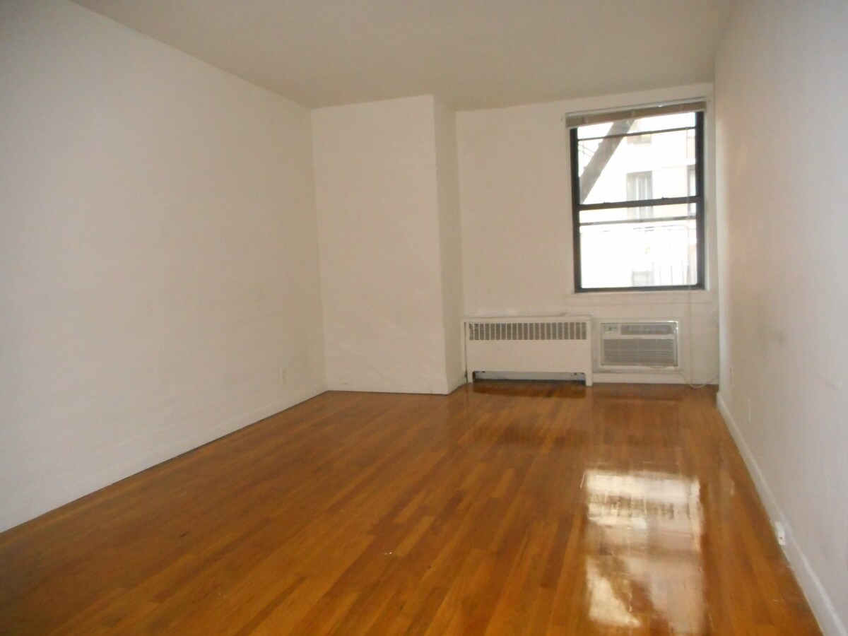 Photo - 104 E 31st St Apartment