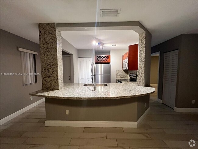 Building Photo - 3421 NW 44th St Unit 104 Rental