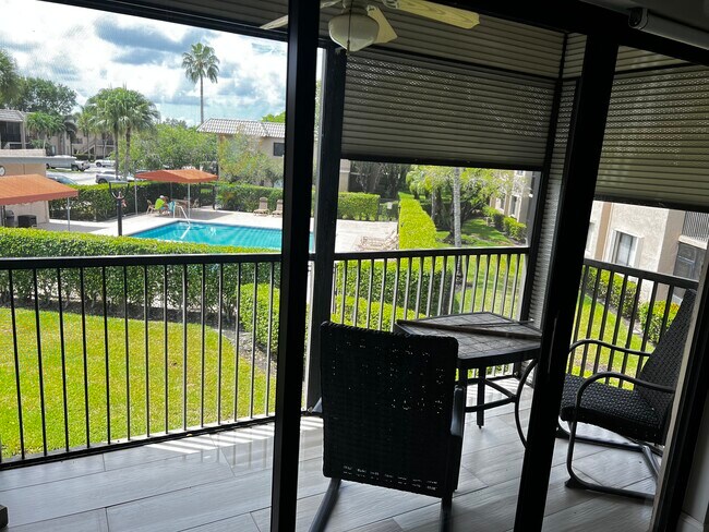 Balcony with Rollers and POOL VIEW - 330 Racquet Club Rd Unit 204