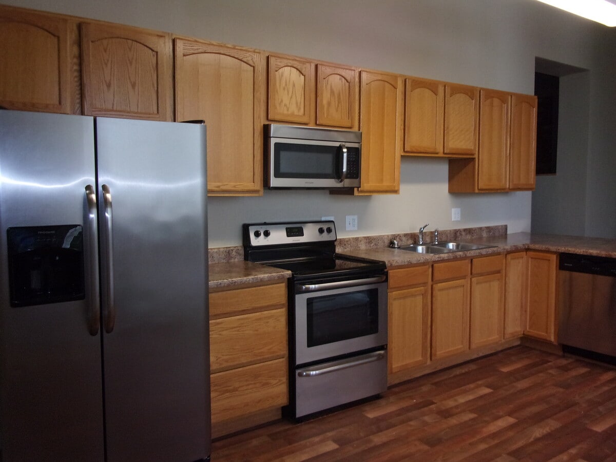 Kitchen with Breakfast Bar - 1310 Washington St Apartments Unit #203