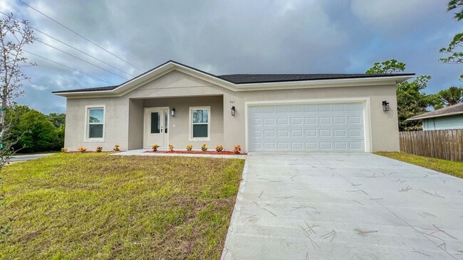 Building Photo - AVAILABLE NOW! 4 BD/2BA Home in Beautiful Palm Bay!! Wonderful home ready for move-in.