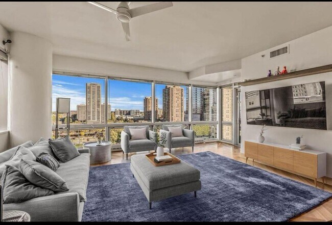 Living Room overlooking Cathedral Square - 545 E Wells St Unit Cathedral Square Condos