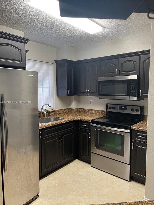 Photo - 6045 NW 186th St Unidad 301