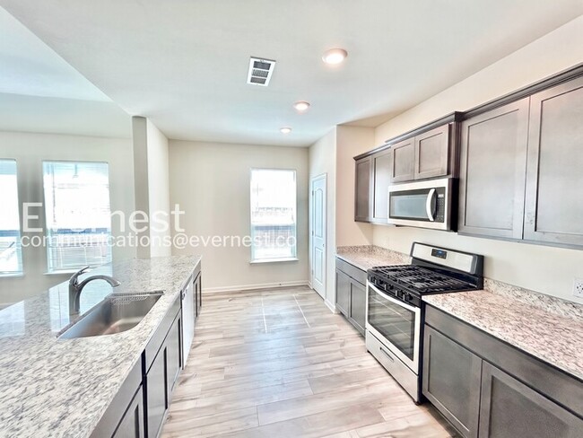 Photo - 4 Bed/2 Bath Home with Garage / Available Now!