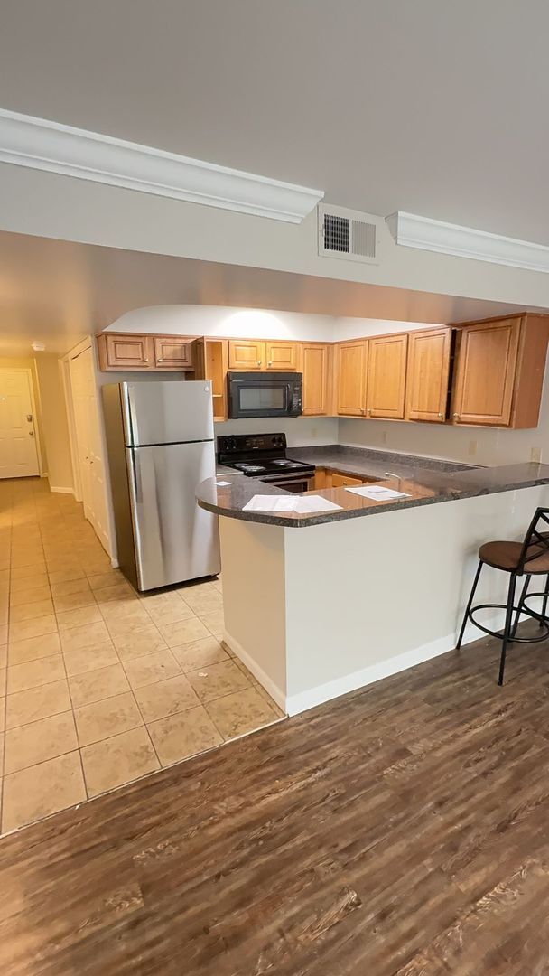 Photo - January 2026 (18-month lease) or FALL 2026 (12-month lease) $3,300/month for ENTIRE UNIT! Great l... Unit 108