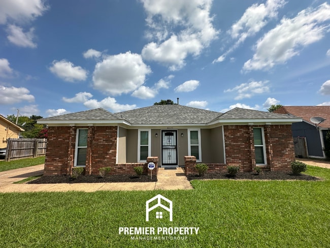 Building Photo - Charming 3BR/2BA Near Southwind | High Vaulted Ceilings, Hardwood Floors & Fireplace