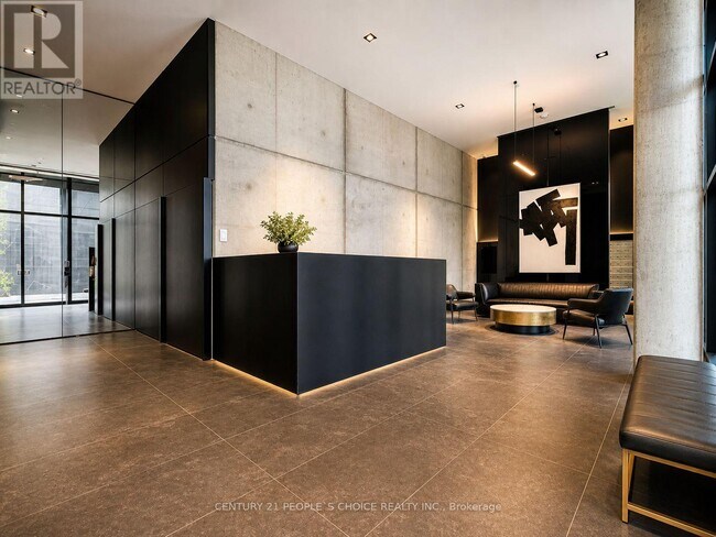 Photo - 21 Lawren Harris Square Unit 910