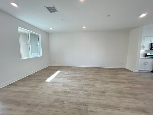 Photo - Gorgeous, 3 level townhome, featuring 2 car garage central Air, and in Unit laundry.