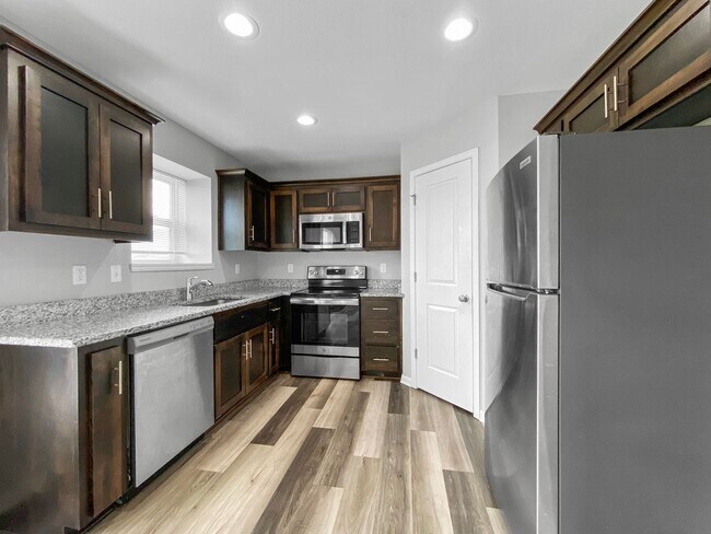 Photo - 4BR/3BA Home for Rent in Peculiar, MO 64078 | 2-Car Garage | Deck | Pet-Friendly | Cass County