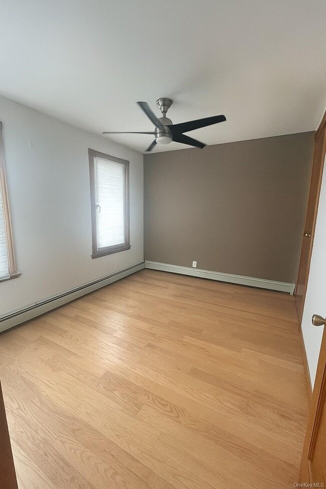 Building Photo - 61-20 55th Dr Unit 1