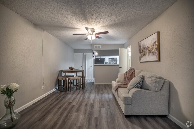 1BR, 1BA - 830SF - Living Room and Dining Room