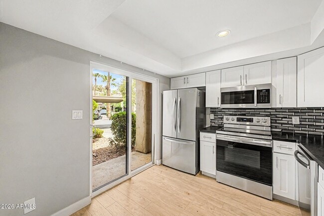 Photo - 9465 N 92nd St Unit 105