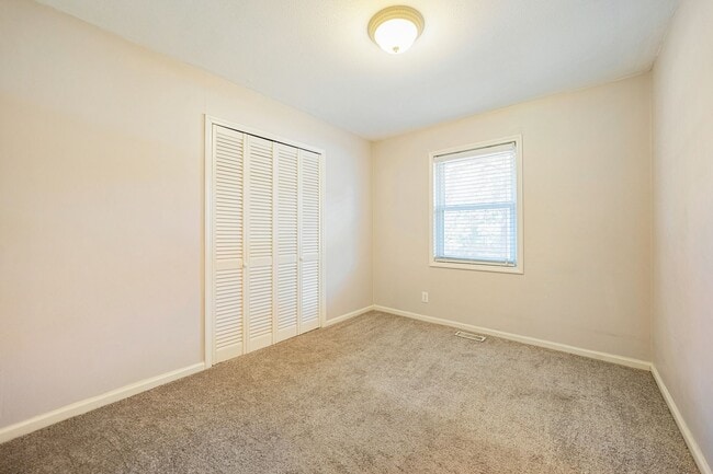 Photo - Charming 3-bed/2 bath home with large yard, screened deck located minutes from Brier Creek!