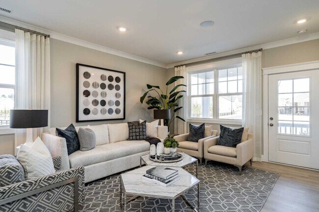 Photo - 3 Bedroom 2.5 Bathroom End Unit Townhome w/ 1st Floor Owners Suite and a 2 car Garage in the hear...