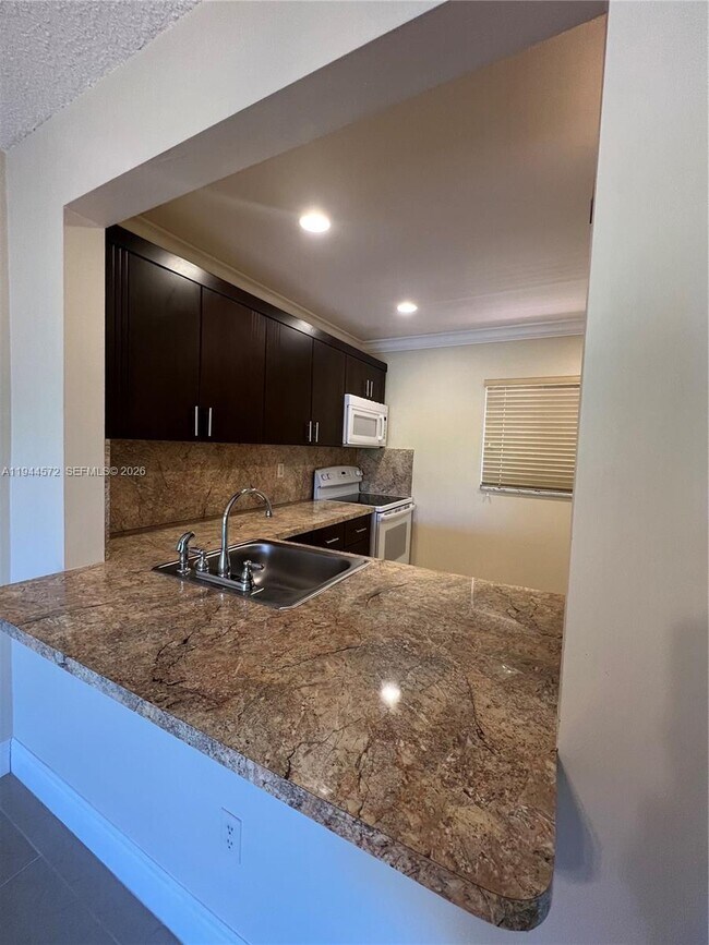 Photo - 7730 Camino Real Unit F-307