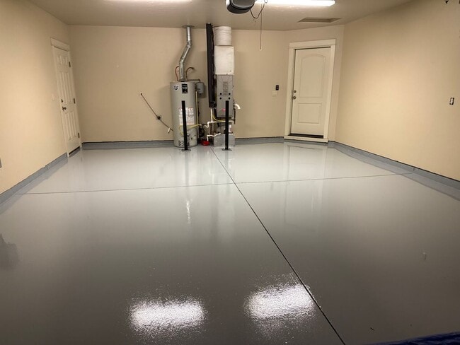 Photo - 4 Bedroom Home: Fenced Backyard & Great Location!