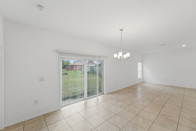 Photo - Modern New Construction 4BR/2BA Home for Rent in Palm Bay – Flexible No-Deposit Move-In Available