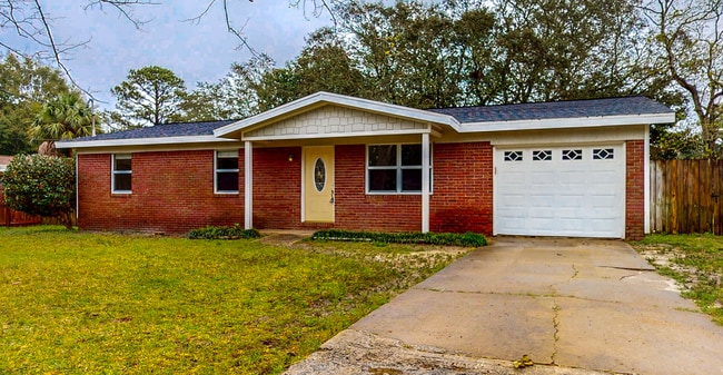 Building Photo - 3/2 with Den and extra long single car gar... Rental