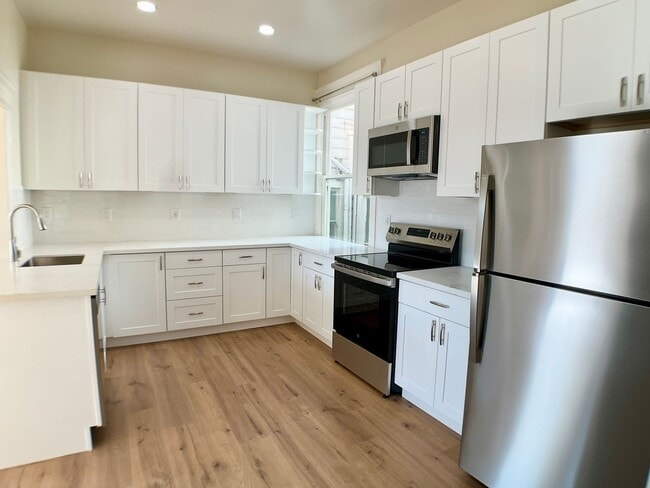 Photo - REMODELED 4BR/3BA. In Unit Laundry! Dishwasher! Bay Windows! Unit 333