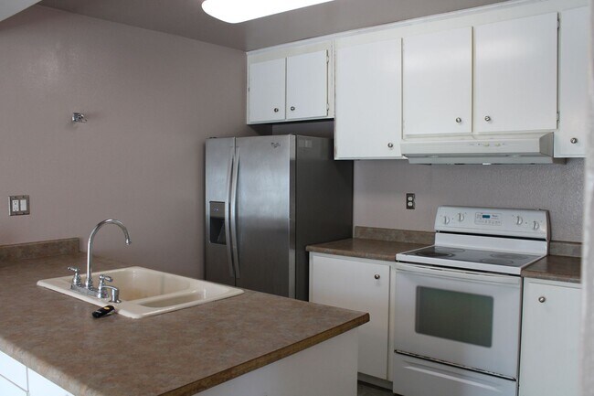 Photo - 2 Bed/ 1.5 Bath Condo with 2 car Garage