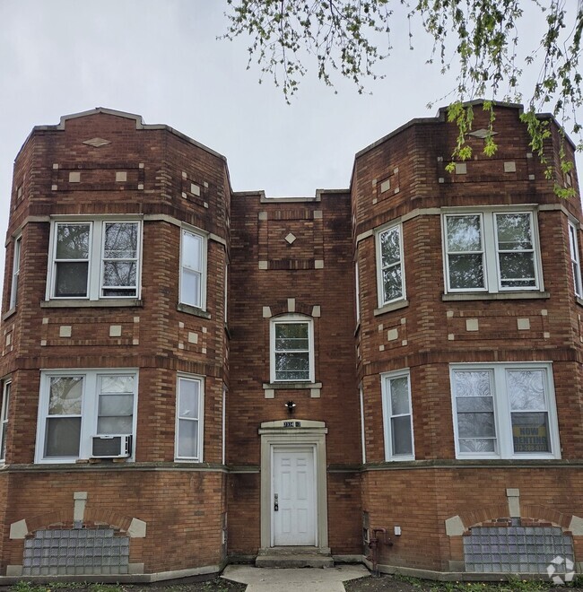 Building Photo - 7332 S May St Rental
