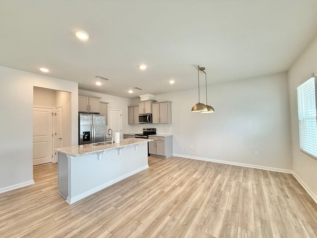 Photo - Stunning 3BD, 2.5BA Wendell Townhome with a 2-Car Garage in a Gorgeous HOA Community with Premium...