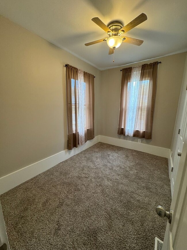 Photo - Charming 3-Bedroom Home with Den on Spacio...