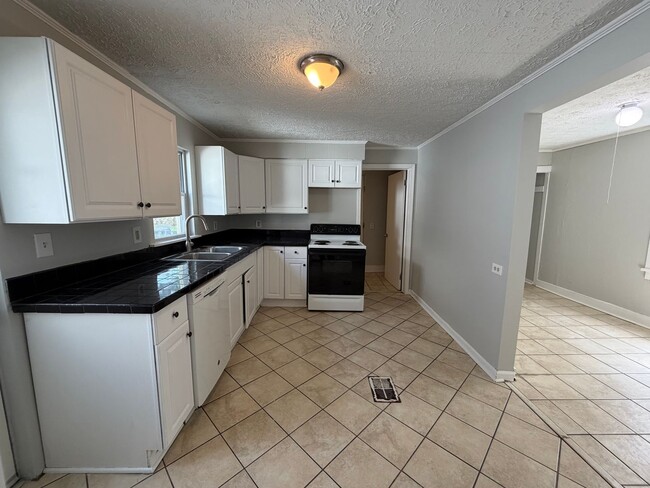 Photo - Charming West Side Home with Covered Porch & First-Floor Laundry