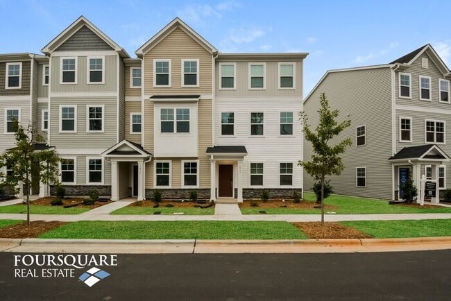 Photo - Modern 3-Story Townhome with First-Level Bedroom, Open Floor Plan & Community Pool – Prime RTP Lo...