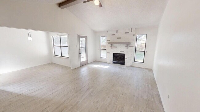 Photo - "Charming 3-Bedroom Oasis with Granite Touches & Cozy Fireplace on Sagebrush Drive!"