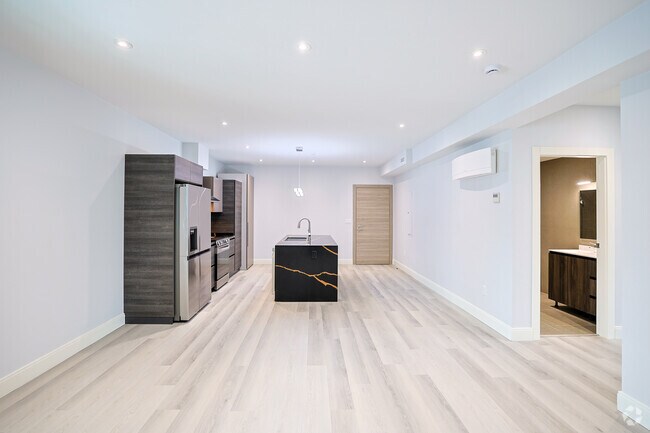 1BR, 1BA - 846SF - Living Room & Kitchen