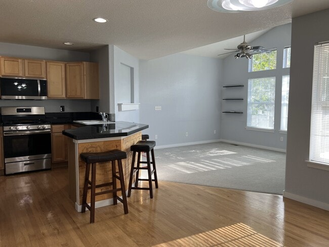 Open Floor Plan: Kitchen + Living Area - 14239 Pikeminnow Pl