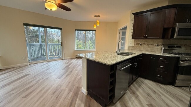 Building Photo - Major Updates! Raised Ranch Style Condo wi... Unit E3